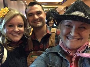 Y Leaders: Cindy Burreson at Hoedown at Sundown with two other people.